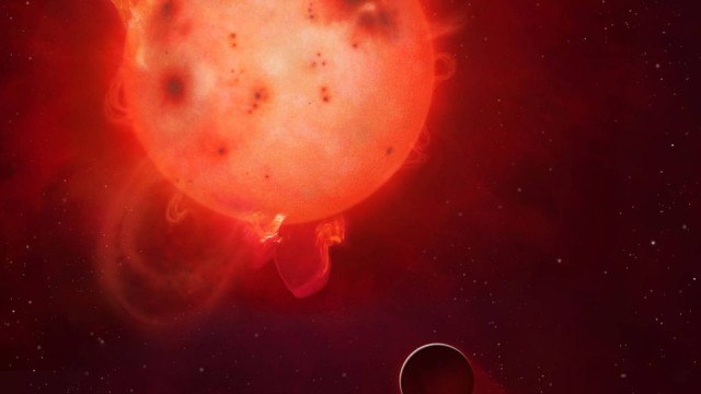 Ilustração mostra a anã vermelha Kepler-438 com o planeta extrassolar em sua órbita: intensa atividade da estrela seria capaz de destruir atmosfera do Kepler-438b