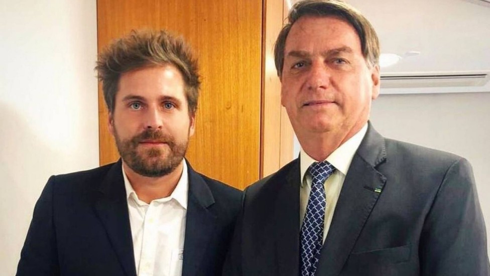 Thiago ao lado do presidente Jair Bolsonaro