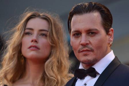 O ator americano Johnny Depp e Amber Heard na exibição do filme 
