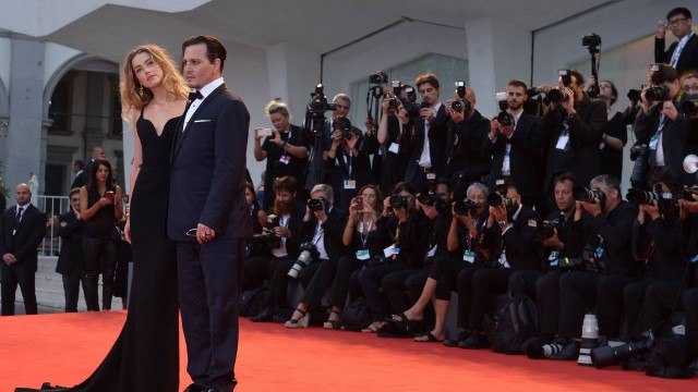 O ator americano Johnny Depp e Amber Heard na exibição do filme "Aliança do crime"